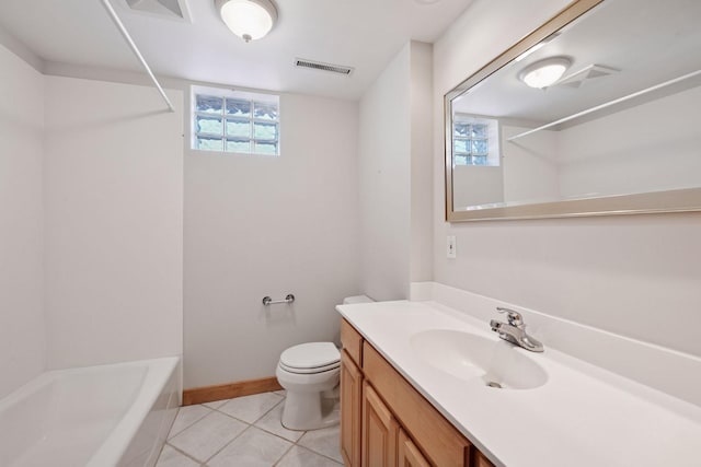 full bath with tile patterned flooring, a bath, visible vents, and plenty of natural light