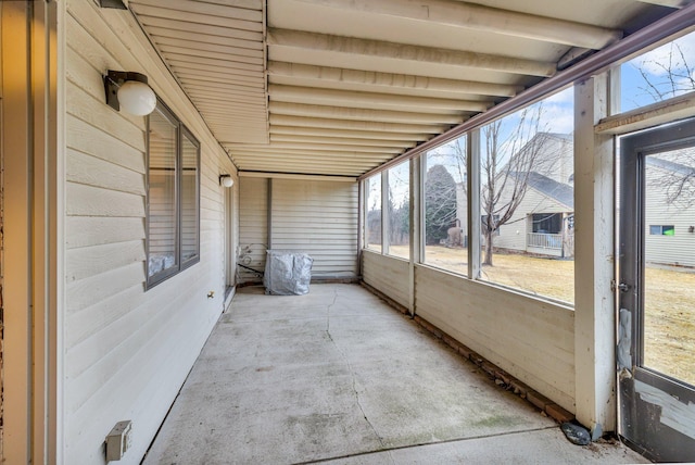 unfurnished sunroom with a healthy amount of sunlight