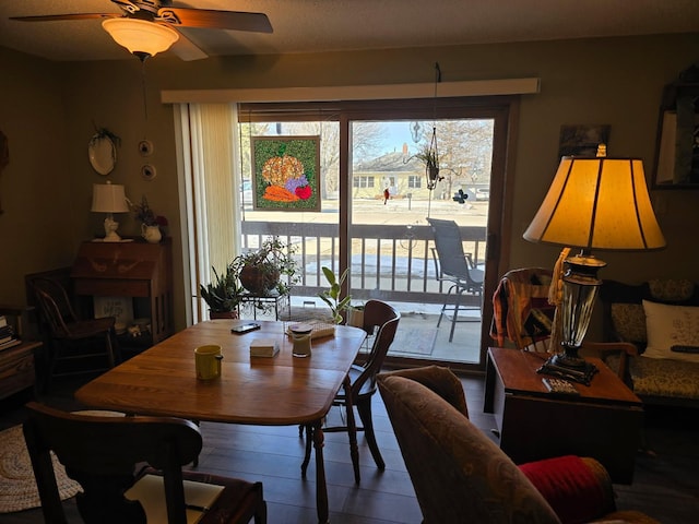 dining space featuring ceiling fan