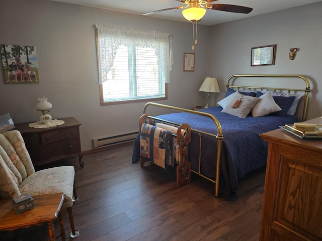 bedroom featuring a baseboard radiator, ceiling fan, and hardwood / wood-style floors