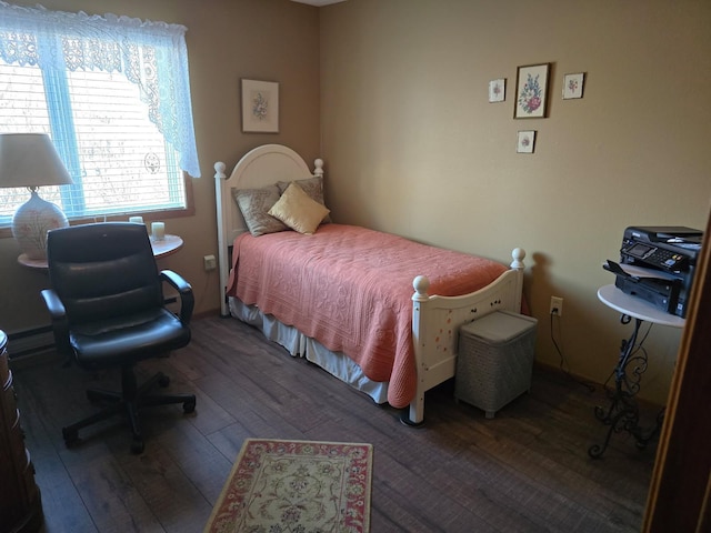 bedroom with wood-type flooring