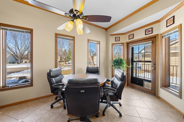 office space with light tile patterned floors, ceiling fan, crown molding, and baseboards