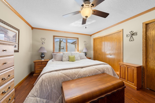 bedroom with a textured ceiling, dark wood finished floors, and crown molding