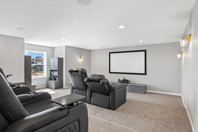 home theater room with light carpet, baseboards, a textured ceiling, and recessed lighting