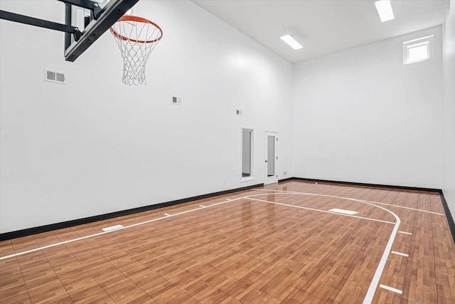 view of sport court featuring basketball hoop