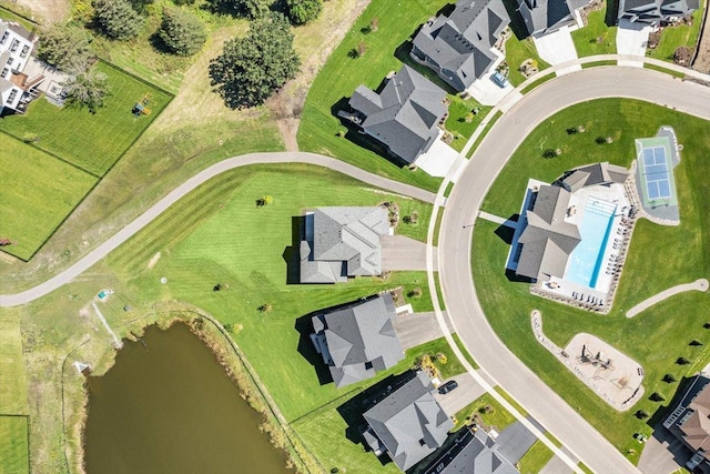 aerial view with a residential view and a water view