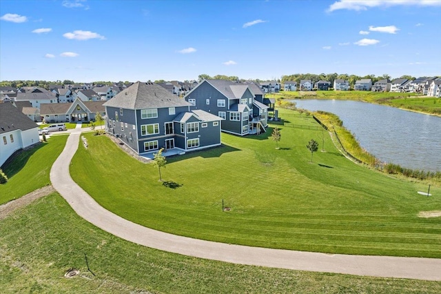 aerial view featuring a residential view and a water view