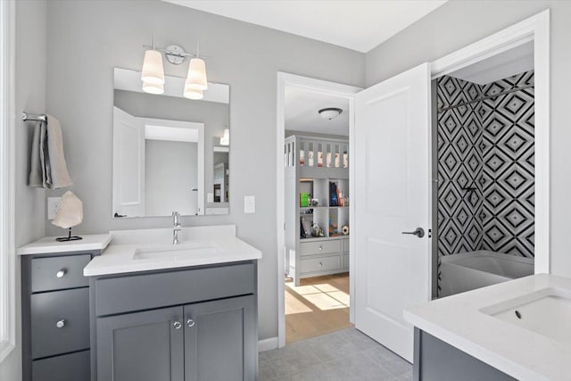 16700 47th Ave N, Plymouth, MN 55446 - full bathroom featuring two vanities, tile patterned flooring, and shower / bath combination