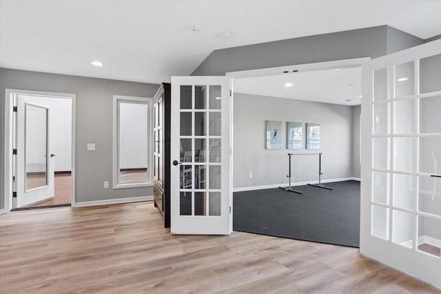 16700 47th Ave N, Plymouth, MN 55446 - unfurnished room with french doors, wood finished floors, baseboards, and recessed lighting