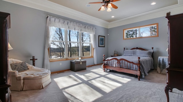 bedroom with baseboards, carpet flooring, and crown molding