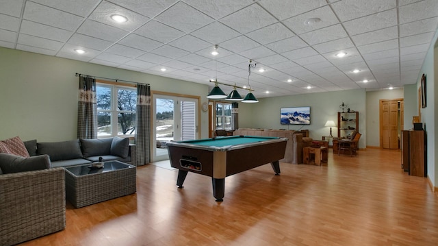 game room with a paneled ceiling, light wood finished floors, billiards, and recessed lighting