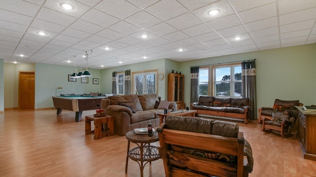 living area featuring light wood-type flooring, billiards, a paneled ceiling, and recessed lighting