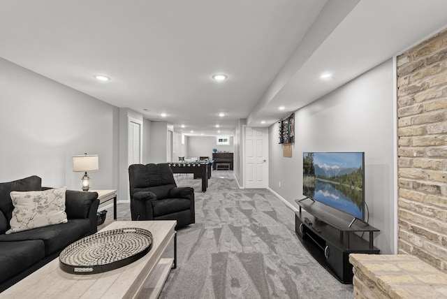 carpeted living room featuring recessed lighting and baseboards