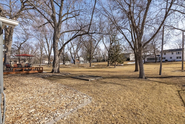 view of yard with a deck