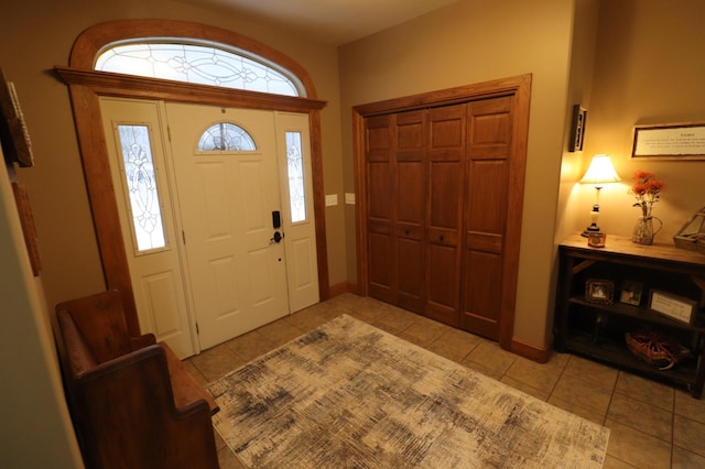 entryway featuring light tile patterned floors