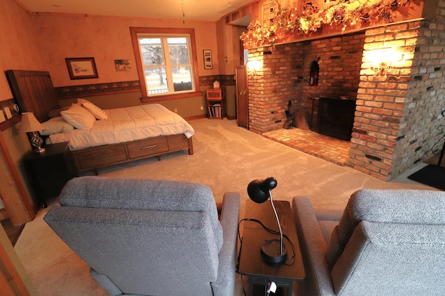 bedroom with carpet floors, a wainscoted wall, and a fireplace