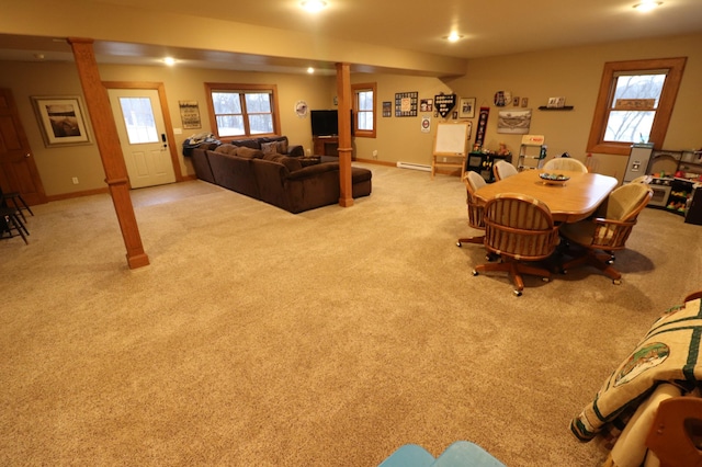 carpeted dining room with ornate columns, recessed lighting, a baseboard radiator, and baseboards