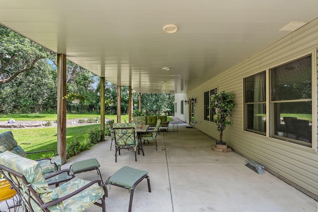 view of patio / terrace with outdoor dining area and an outdoor living space