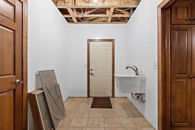 3126 137th Ave NE, Ham Lake, MN 55304 - washroom with a sink and light tile patterned flooring