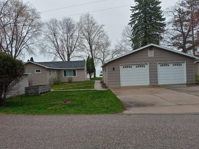 view of front facade featuring a front lawn and a garage