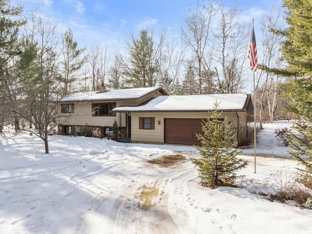 view of front of home with a garage