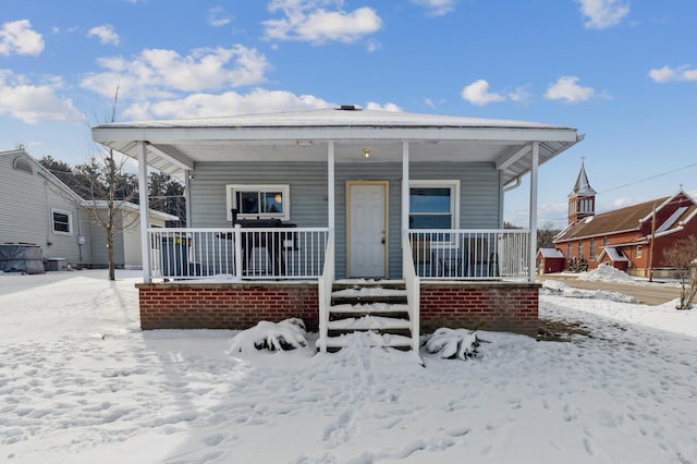 view of front of home featuring covered porch