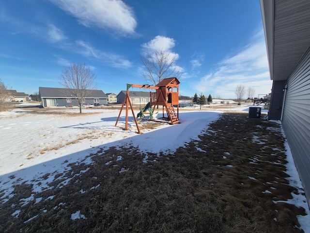 snow covered playground featuring playground community