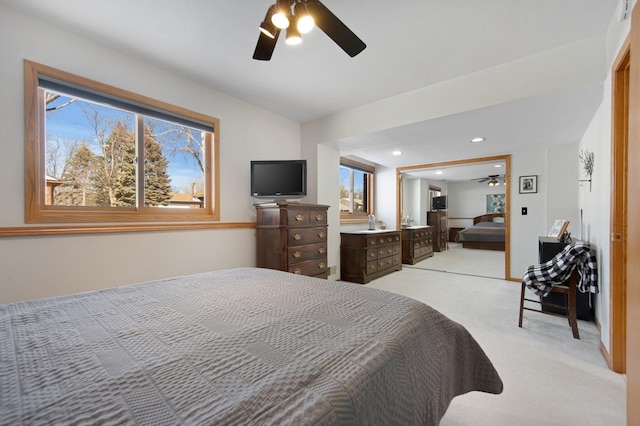 bedroom with light carpet, recessed lighting, and a ceiling fan