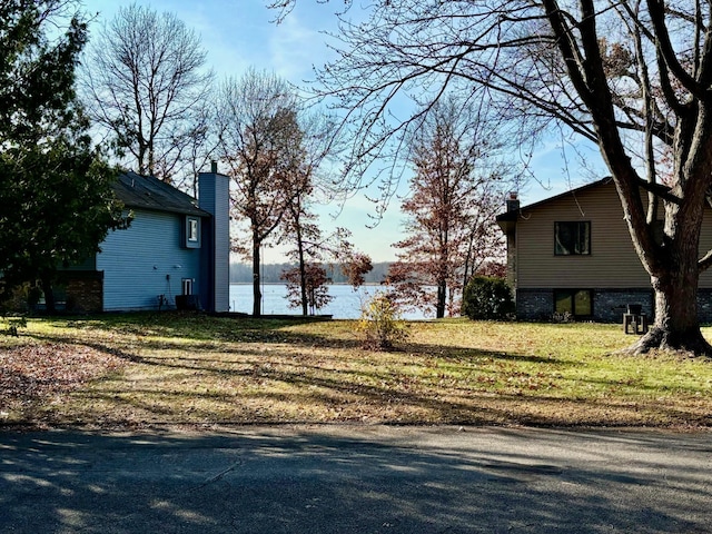 view of yard with a water view