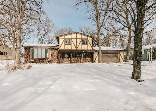 tudor home with a garage