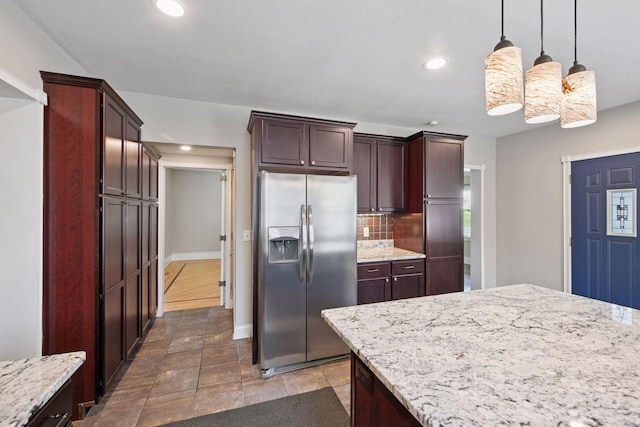 301 Lake St, Waconia, MN 55387 - kitchen featuring stainless steel refrigerator with ice dispenser, backsplash, light stone countertops, pendant lighting, and recessed lighting