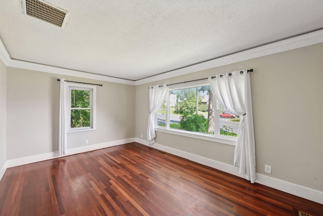 301 Lake St, Waconia, MN 55387 - unfurnished room with ornamental molding, a textured ceiling, healthy amount of natural light, dark wood-type flooring, and baseboards