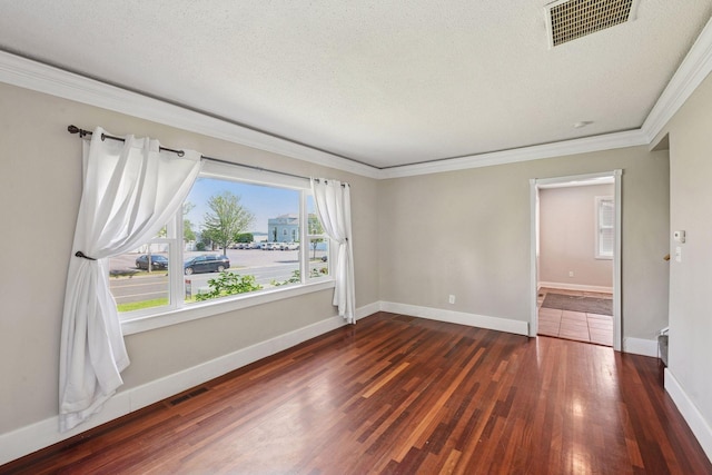 301 Lake St, Waconia, MN 55387 - spare room with wood finished floors, a textured ceiling, crown molding, and baseboards