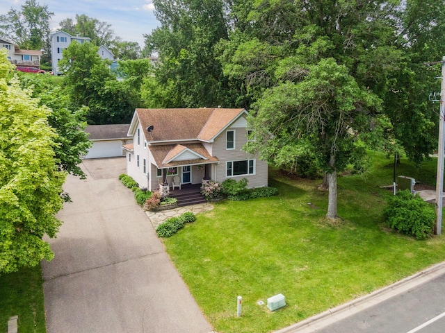 301 Lake St, Waconia, MN 55387 - view of front of property with a front yard, a garage, and roof with shingles