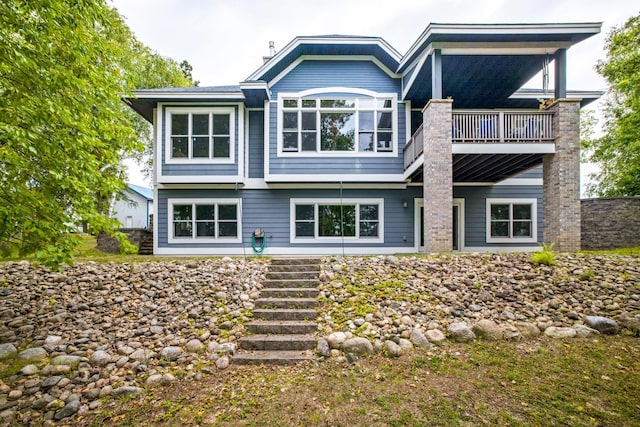 35365 Boot Lake Rd, Park Rapids, MN 56470 - rear view of house with a balcony
