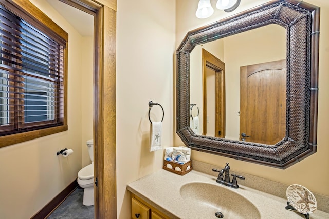 35365 Boot Lake Rd, Park Rapids, MN 56470 - half bathroom featuring vanity, toilet, and baseboards