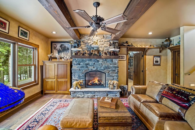 35365 Boot Lake Rd, Park Rapids, MN 56470 - living room featuring a fireplace, recessed lighting, light wood-style floors, ceiling fan, and beamed ceiling