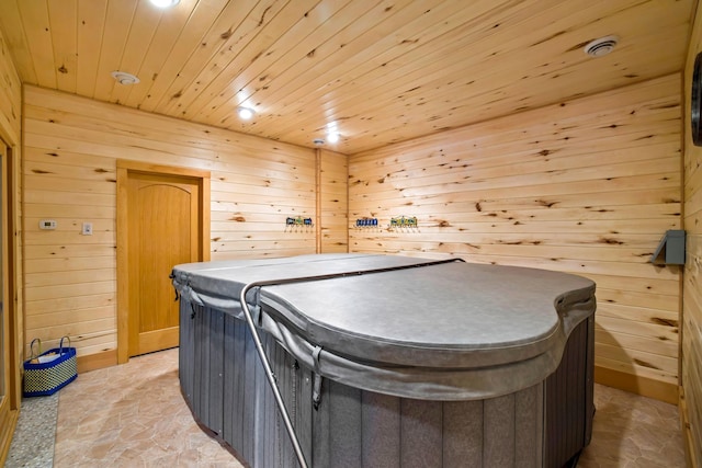 35365 Boot Lake Rd, Park Rapids, MN 56470 - interior space featuring stone finish floor, wooden ceiling, a jacuzzi, and wooden walls
