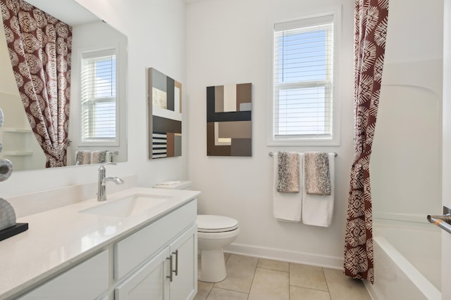 full bathroom featuring toilet, tile patterned floors, vanity, baseboards, and shower / tub combo with curtain