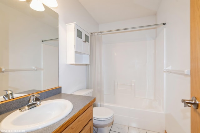 bathroom featuring toilet, shower / bath combination with curtain, and vanity