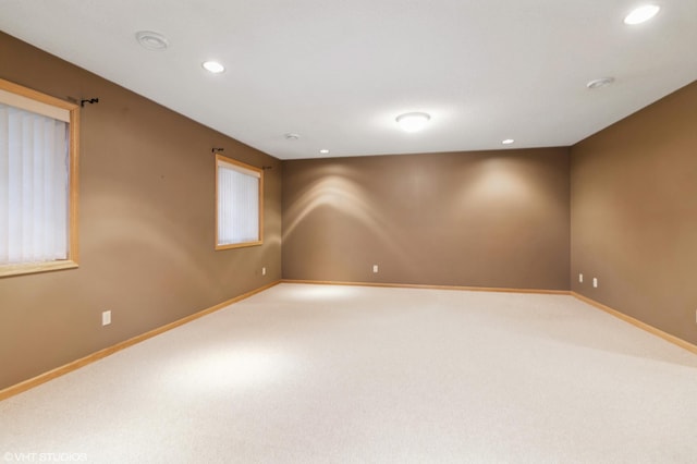 unfurnished room with baseboards, carpet flooring, and recessed lighting