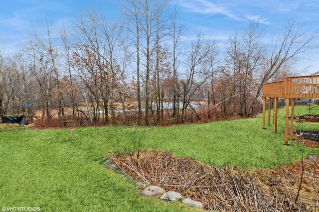 view of yard featuring a deck