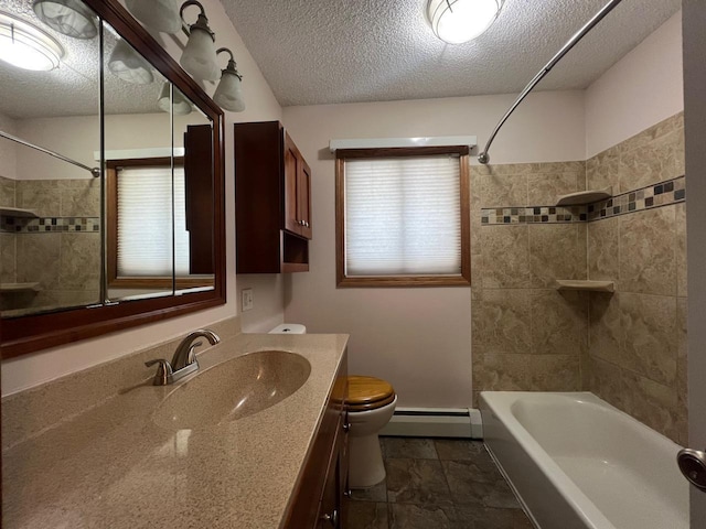 bathroom with toilet, baseboard heating, a textured ceiling, vanity, and shower / washtub combination