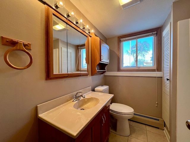 bathroom with a baseboard heating unit, a wealth of natural light, a textured ceiling, and toilet