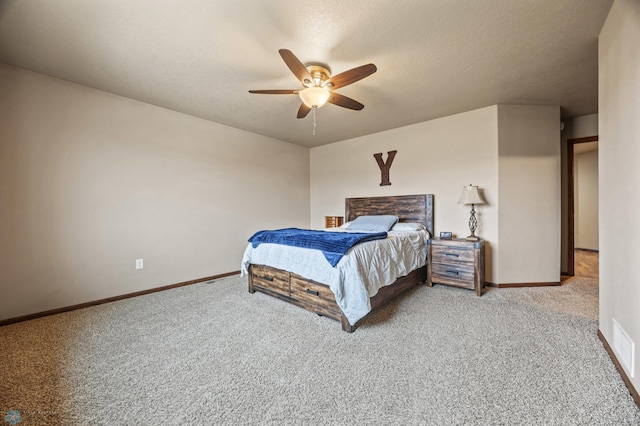 bedroom featuring visible vents, carpet flooring, a ceiling fan, and baseboards