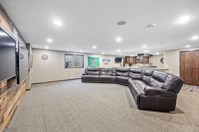 living area featuring light carpet, baseboard heating, baseboards, and recessed lighting