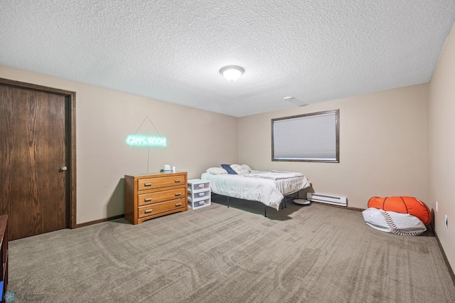 bedroom featuring carpet floors, a baseboard radiator, baseboards, and a textured ceiling