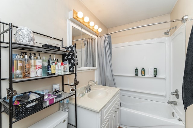 bathroom featuring toilet, shower / bath combination with curtain, and vanity