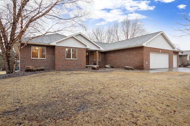 ranch-style house with brick siding, an attached garage, and a shingled roof