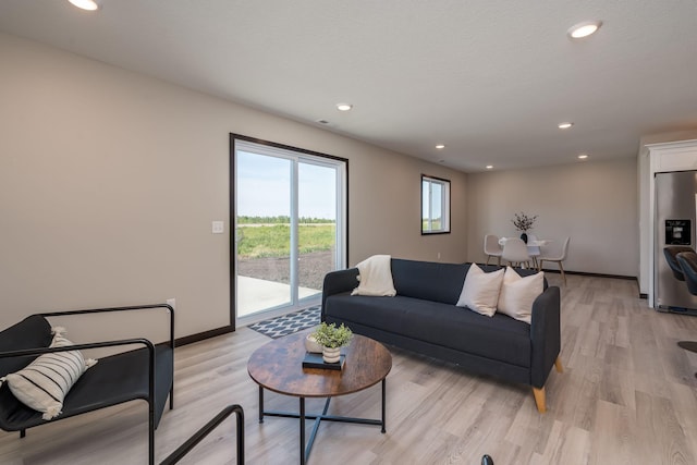 3108 Scotch Ln, Mankato, MN 56001 - living area with light wood finished floors, recessed lighting, and baseboards